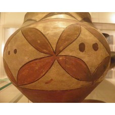 Polychrome water jar, four-point flower-like design